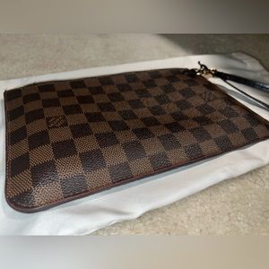 Authentic LV wristlet. It comes with the full size never fully Louis Vuitton